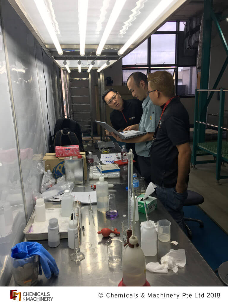 Our engineers and salesmen putting their best foot forward when analyzing their findings in our client's laboratory